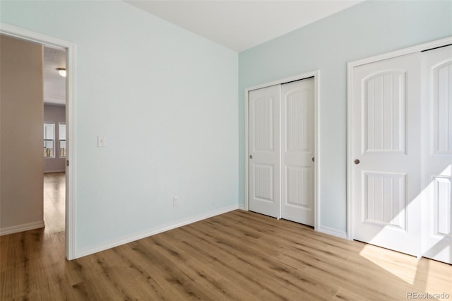 8339 Mosby Way, Colorado Springs, CO 80908 - unfurnished bedroom with light wood-style floors and baseboards