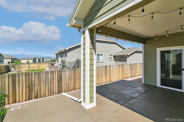 8339 Mosby Way, Colorado Springs, CO 80908 - fenced backyard featuring a patio and a residential view
