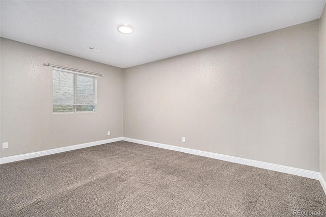 empty room with carpet floors