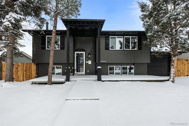 bi-level home featuring a garage