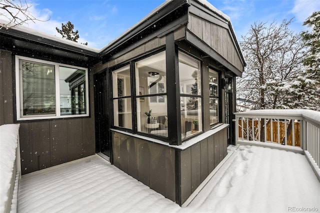 view of snow covered deck