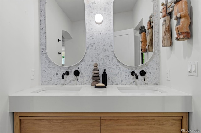 bathroom with backsplash and vanity