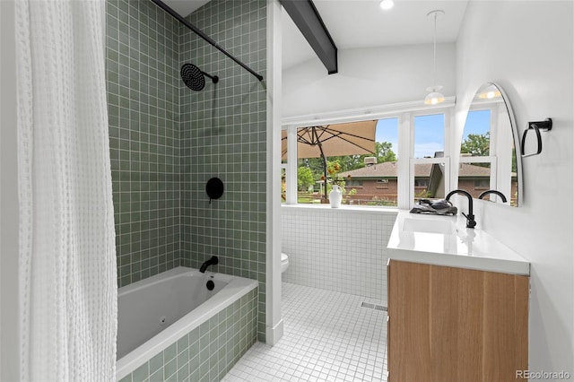 full bathroom featuring tile patterned floors, vanity, shower / bath combo with shower curtain, beam ceiling, and toilet