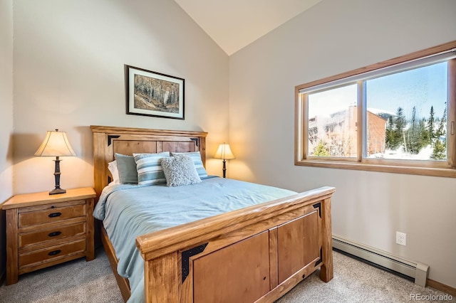 91400 Ryan Gulch Rd Unit 91427, Silverthorne, CO 80498 - bedroom featuring baseboards, vaulted ceiling, a baseboard radiator, and light colored carpet