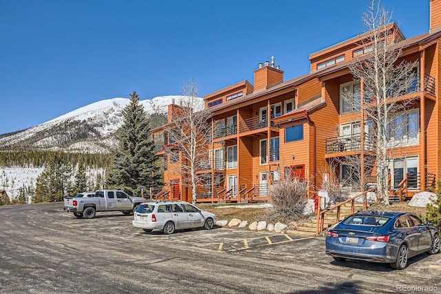 91400 Ryan Gulch Rd Unit 91427, Silverthorne, CO 80498 - view of property featuring a mountain view and uncovered parking
