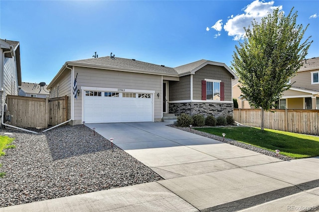 view of front facade with a front yard and a garage