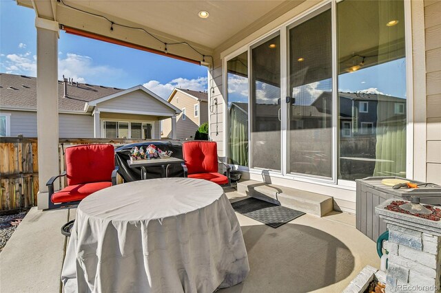 view of patio with fence