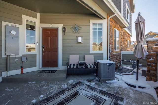 doorway to property with central AC