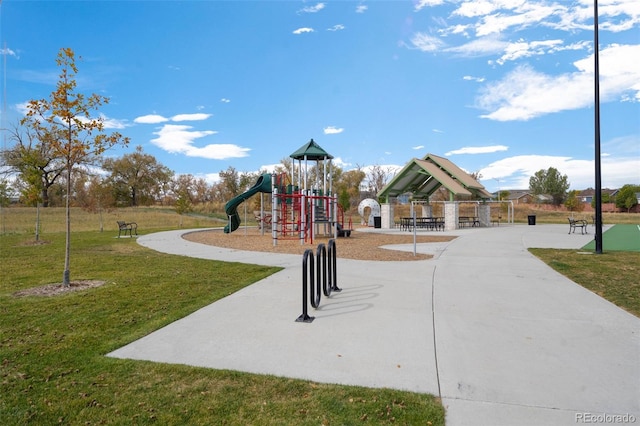 view of jungle gym with a yard