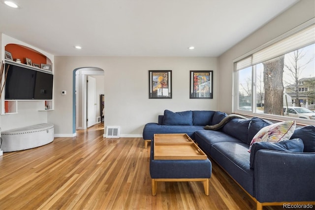 living room with hardwood / wood-style floors