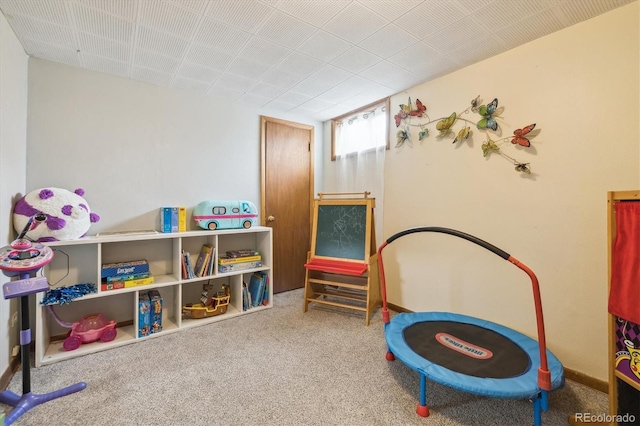 recreation room with carpet floors