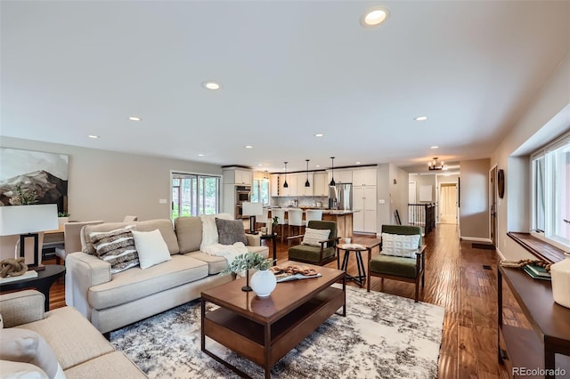 4776 Red Rock Dr, Larkspur, CO 80118 - living room featuring recessed lighting, hardwood / wood-style flooring, and baseboards
