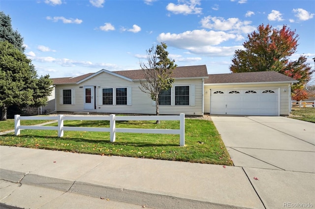 single story home with a front lawn and a garage