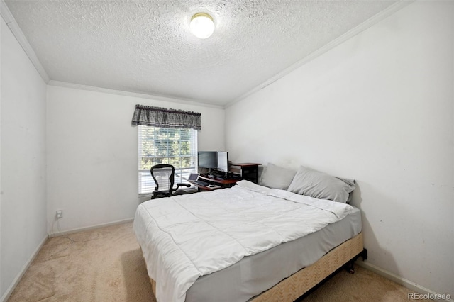 carpeted bedroom featuring ornamental molding and a textured ceiling