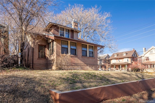 view of front of home with a front yard