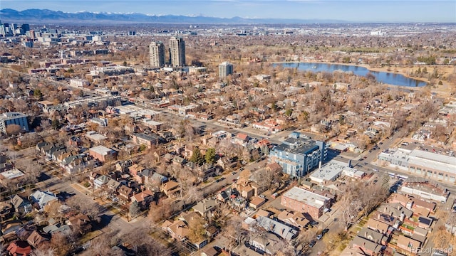 drone / aerial view with a water and mountain view