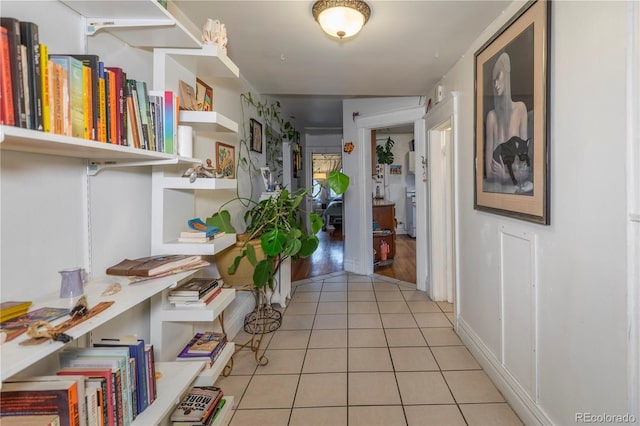 hallway with light tile patterned flooring