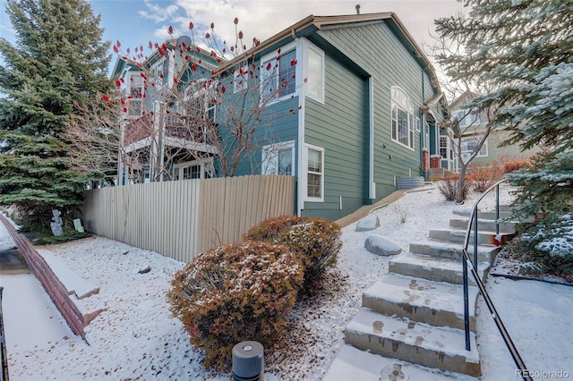 view of snow covered property