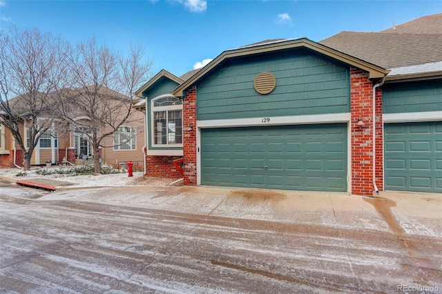 view of front of property featuring a garage