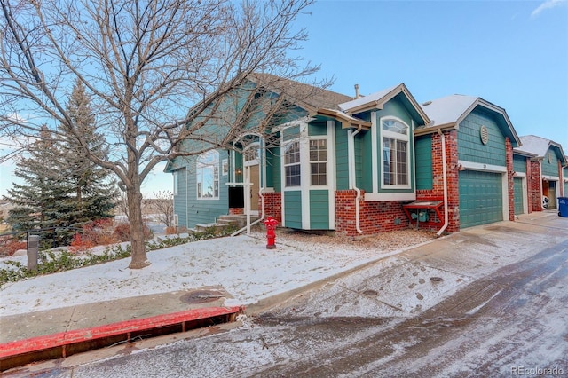 view of front of home with a garage