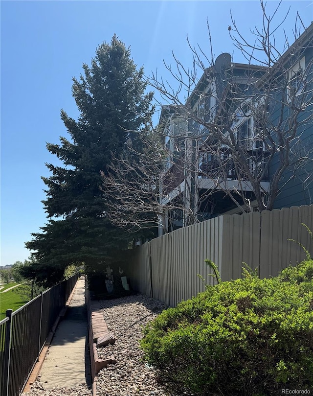 view of yard featuring fence
