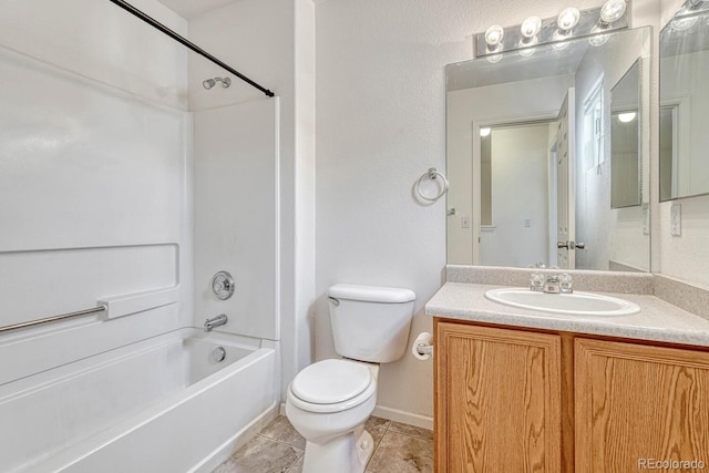 full bath featuring tile patterned flooring, shower / washtub combination, toilet, and vanity