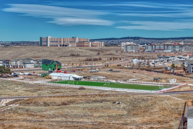 birds eye view of property with a view of city