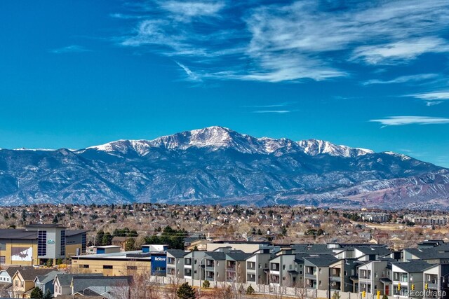 property view of mountains featuring a residential view