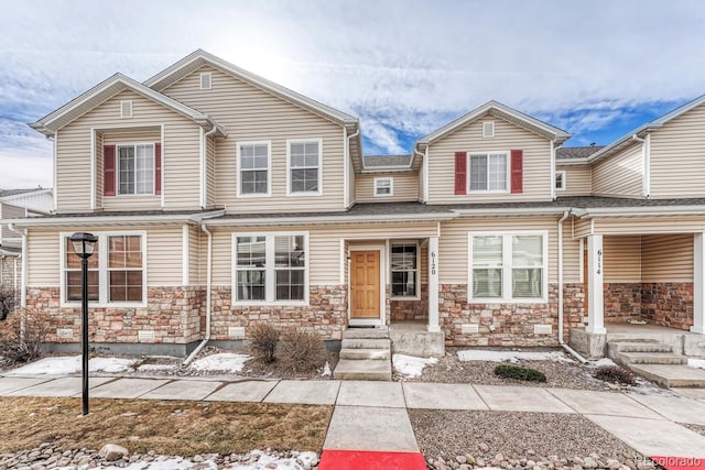 view of front of house with stone siding