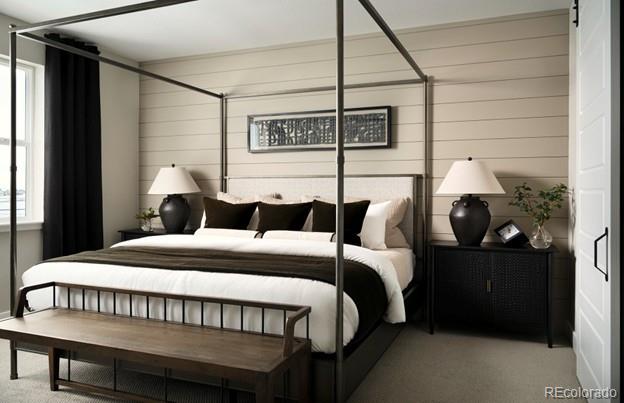 4125 N Duquesne Ct, Aurora, CO 80019 - carpeted bedroom featuring wood walls