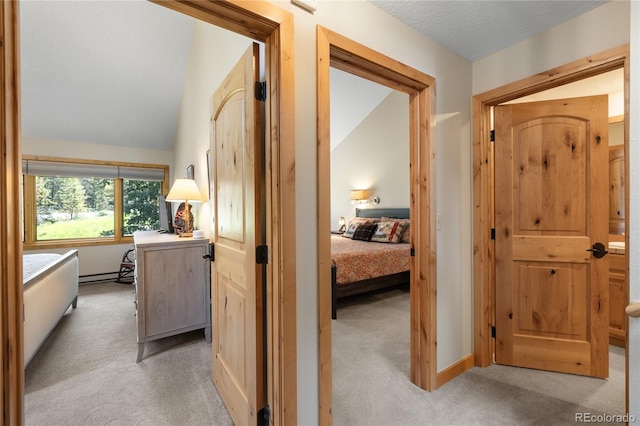 22300 US Highway 6 Unit 1746, Dillon, CO 80435 - hall featuring light colored carpet and baseboard heating