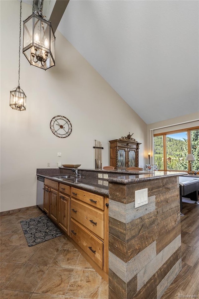 22300 US Highway 6 Unit 1746, Dillon, CO 80435 - bathroom with a chandelier, high vaulted ceiling, and vanity