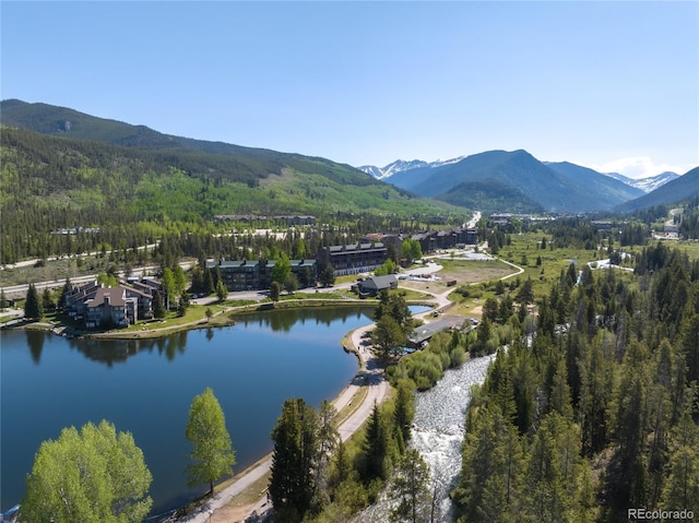 22300 US Highway 6 Unit 1746, Dillon, CO 80435 - aerial view of property and surrounding area featuring a water and mountain view and a heavily wooded area