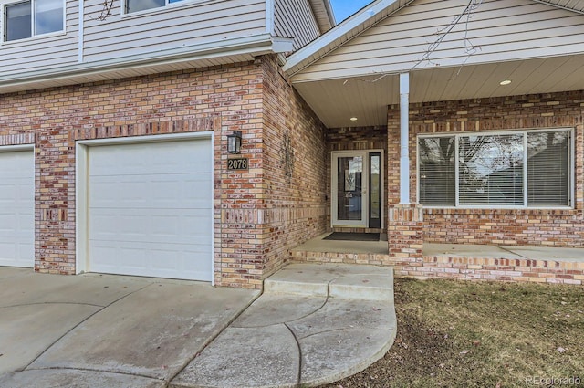 property entrance with a garage