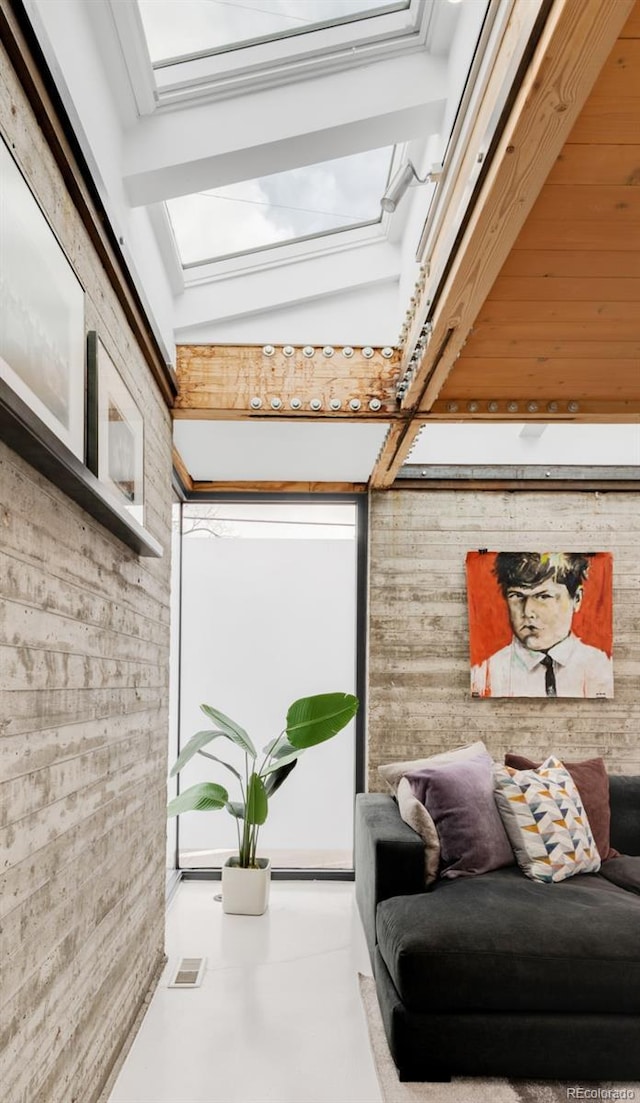 interior space featuring visible vents and finished concrete flooring