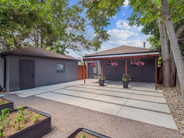 3050 S Delaware St, Englewood, CO 80110 - view of patio with a vegetable garden