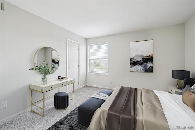 4273 S Salida Way Unit 1, Aurora, CO 80013 - carpeted bedroom featuring baseboards