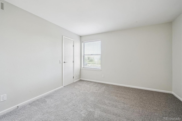 4273 S Salida Way Unit 1, Aurora, CO 80013 - carpeted spare room featuring baseboards