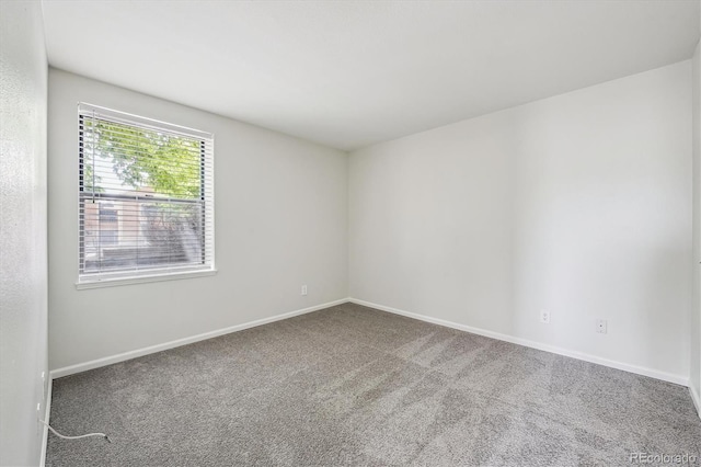 4273 S Salida Way Unit 1, Aurora, CO 80013 - carpeted spare room with baseboards