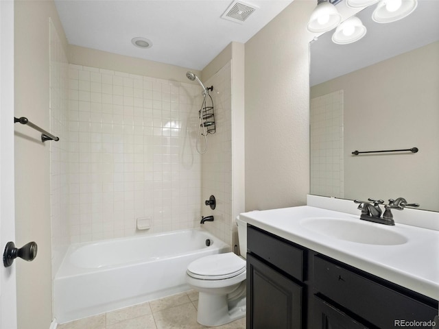 41 Garner Ln, Erie, CO 80516 - bathroom with toilet, tile patterned flooring, shower / tub combination, and vanity