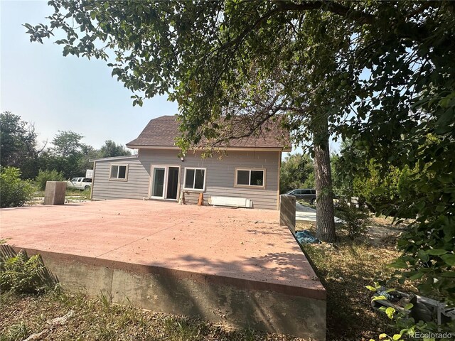 back of house featuring a patio