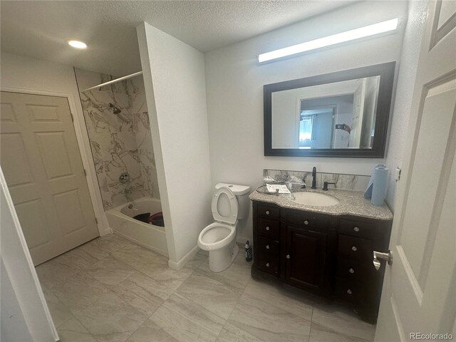 bathroom with vanity, a textured ceiling, shower / tub combination, toilet, and marble finish floor