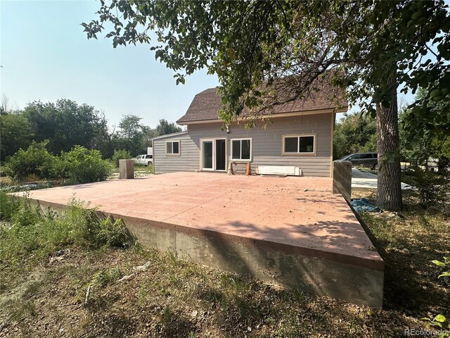 rear view of property with a patio