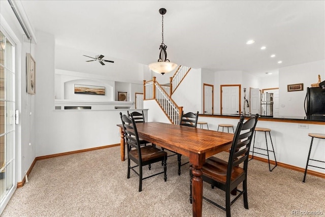 11705 W Stanford Ln, Morrison, CO 80465 - dining space featuring baseboards, light carpet, stairs, recessed lighting, and a ceiling fan