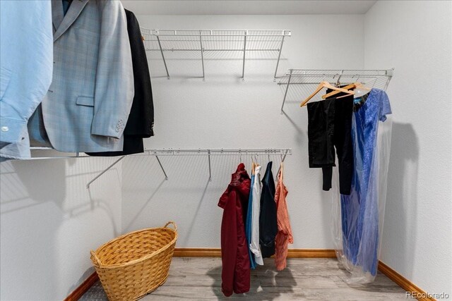 11705 W Stanford Ln, Morrison, CO 80465 - spacious closet featuring wood finished floors