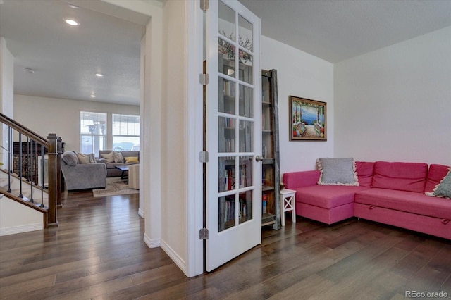 living room featuring dark hardwood / wood-style floors