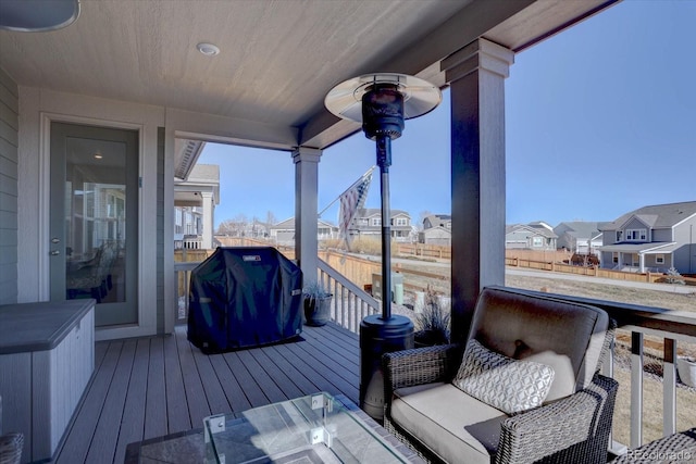 wooden terrace featuring area for grilling