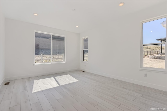 empty room featuring light hardwood / wood-style flooring