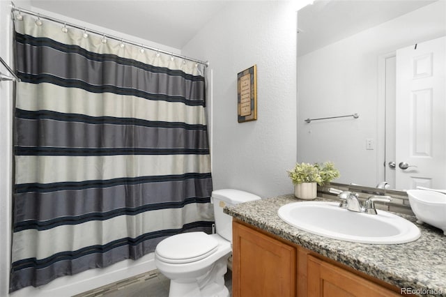 bathroom featuring walk in shower, vanity, toilet, and wood-type flooring