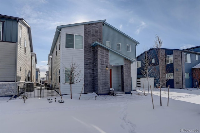 view of snow covered property